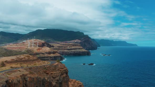 Wind Farm Turbine On The Cliff Edge Near Miradouro da Ponta do Rosto, East of Madeira Island, Portug