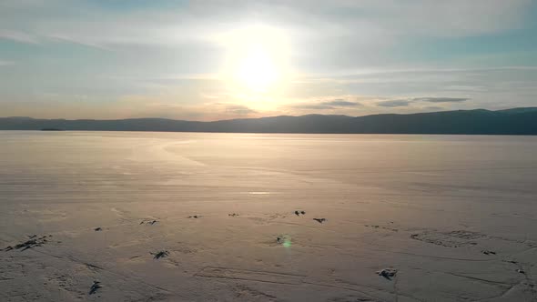 Drone View of the Frozen Lake Baikal at Sunset