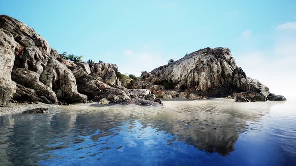 Summer View of Sea Caves and Rock Cliffs