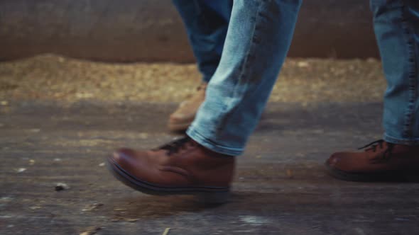 Closeup Livestock Workers Legs Walking Wooden Shed