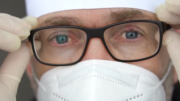 Overworked Health Workers with Protective Mask on Face