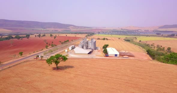 Agricultural land with grain storage silos. Aerial photography.