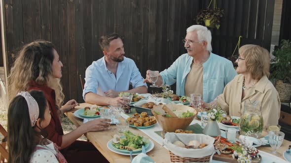 Family Members Clinking Glasses