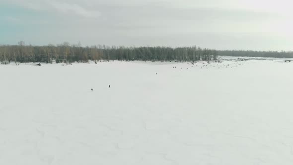 Frozen River Surface Covered with Thick Snow and Ice Layer