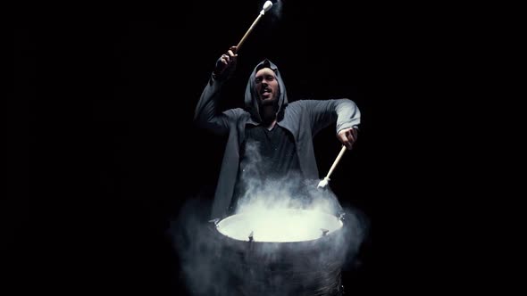 Emotional Drummer on a Black Background