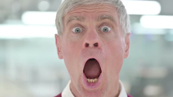 Close Up of Shocked Middle Aged Man