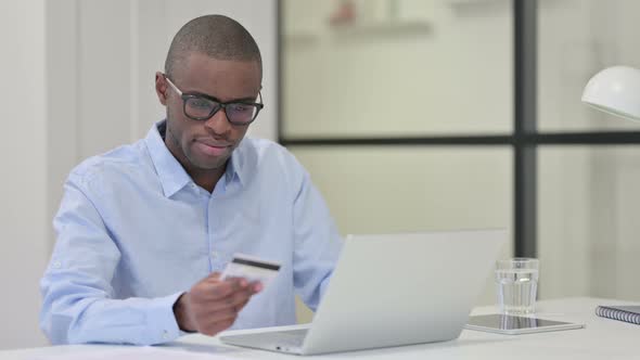 Online Shopping Failure African Man Laptop