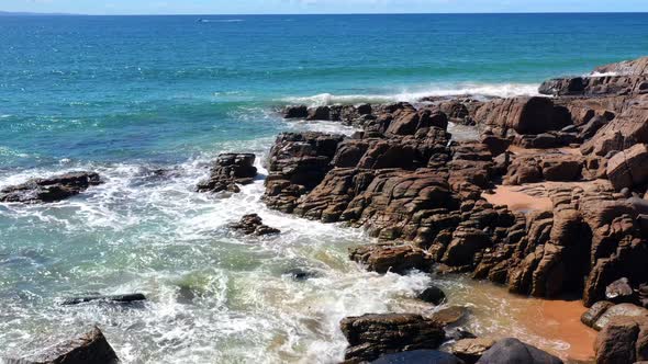 Ocean Waves And Rocky Shore Of The Beach In Noosa Heads, Queensland, Australia - aerial drone shot