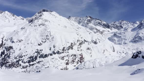 Aerial drone flight over Kaunertal in winter