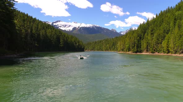 Two men sailing in the boat on a sunny day 4K 4k