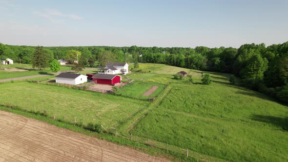 Drone view of house in farmland