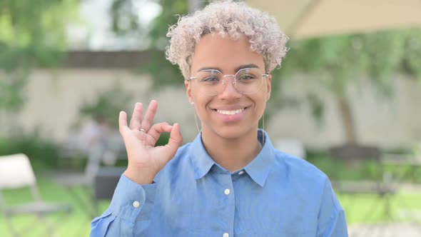 Portrait of Young African Woman Showing Okay Sign OK