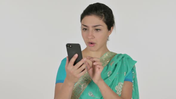 Indian Woman Reacting to Loss on Smartphone White Background
