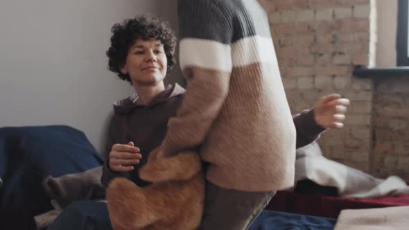 Boy with Toy Hugging Mom in Shelter