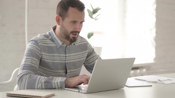 Adult Young Man Excited for Success