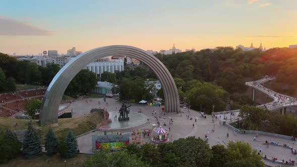 Aerial view of the Friendship of Nations Arch in Kiev during the sunset.