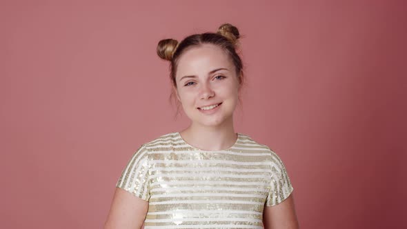 Portrait of smiling caucasian teenage woman. Shot with RED helium camera in 8K.