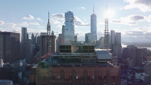 Ascending Forwards Fly Shot of Top of High Rise Building Revealing Jenga Tower and Other Iconic