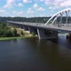 Panoraming Shot of the Darnytsky Bridge Across the River Dnipro in Kyiv in the Afternoon Sunny Day - VideoHive Item for Sale
