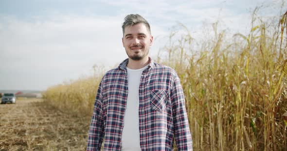 Senior Farmer Portrait Caucasian Man in Plaid Shirt in the Wheat Field Sorghum