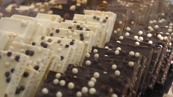 Selection of Artisan Gourmet Chocolate Bars Displayed in Confectionery Shop