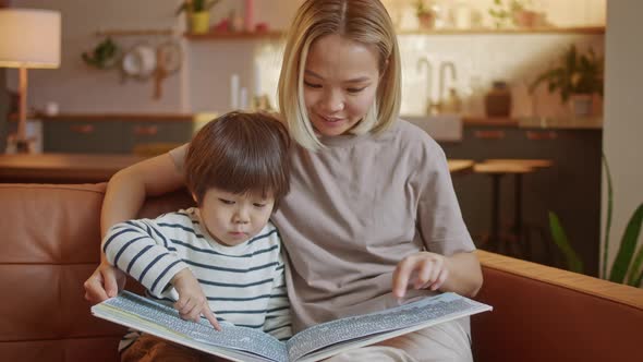 Caring Single Parent Young Mother Babysitter Hug Happy Cute Little Preschool Child Boy Kid Son Hold