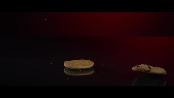 Falling cookies from above onto a reflective surface - COOKIES 237