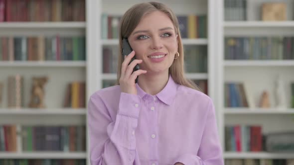 Portrait of Woman Talking on Phone