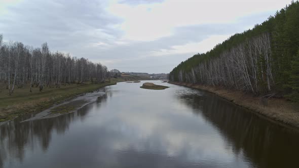 Aerial View of the River in Early Spring.