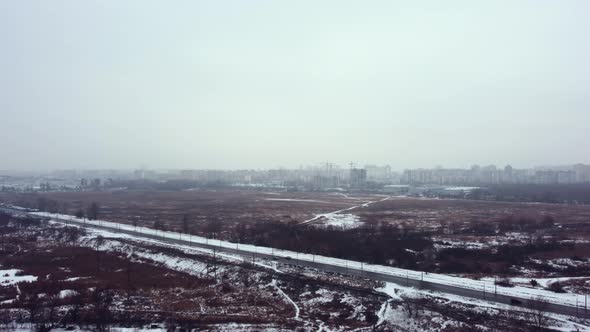 construction of a residential complex on the outskirts of the metropolis. winter. Aerial view.