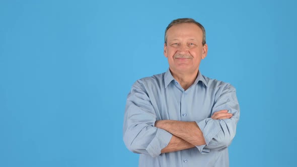 Portrait of a happy yellow man smiling and looking at the camera