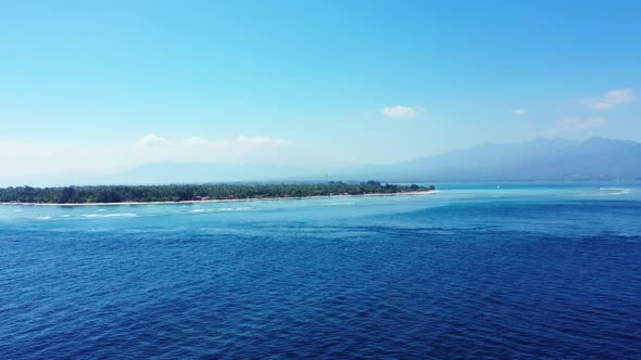 Aerial view abstract of tranquil bay beach journey by aqua blue ocean and clean sandy background of 