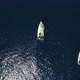 Aerial top view of white yachts with developed sails sailing in nice formation - VideoHive Item for Sale