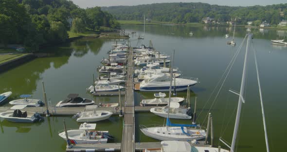 Aerial Tilt Down of Boats Docked at a Marina in Cold Spring Harbor Long Island