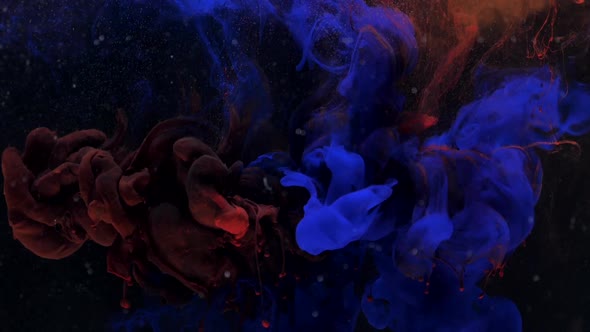 Amazing Blue and Red Ink Acrylic Mixing in Water Swirling Softly Underwater