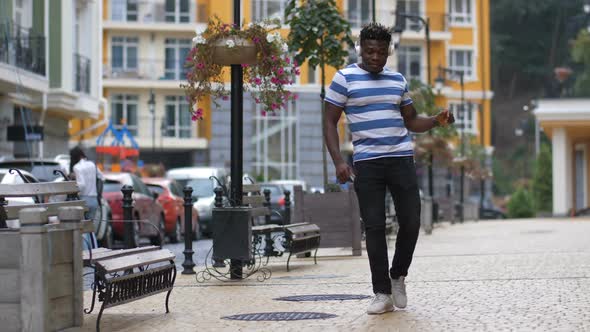 African American Guy Moving in Afrobeat Dance