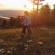 Happy Young Couple Walking on Mountain at Sunset - VideoHive Item for Sale