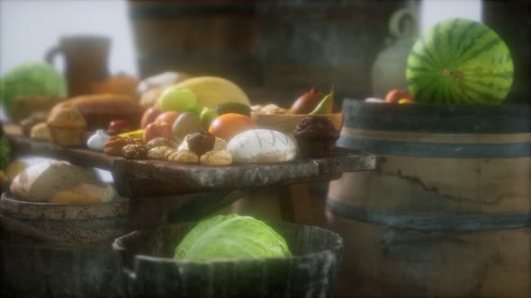 Food Table with Wine Barrels and Some Fruits Vegetables and Bread alt