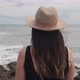 Woman In A Hat Looking At The Sea - VideoHive Item for Sale