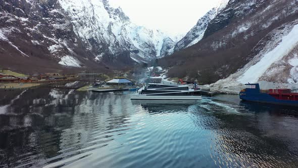 Passenger boat Vision of the fjords turning around and going alongside in Gudvangen Norway - Modern