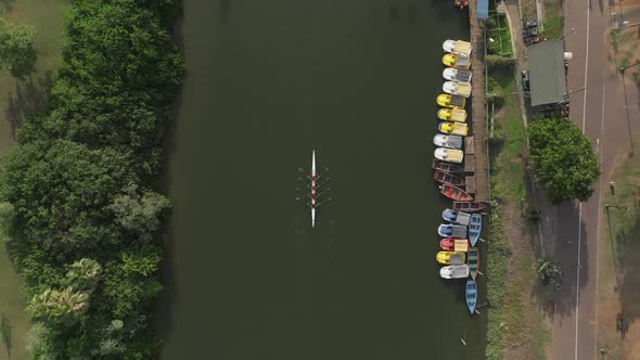 Sport canoe team rowing in a river, Drone footage.