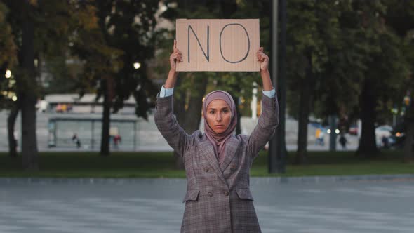 Stop Racism Concept Arab Immigrant Muslim Woman in Hijab Protests Against Discrimination Vax