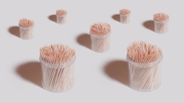 Toothpick Bundles Rotate on the Gray Table