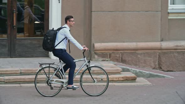 Office Worker Riding Bike