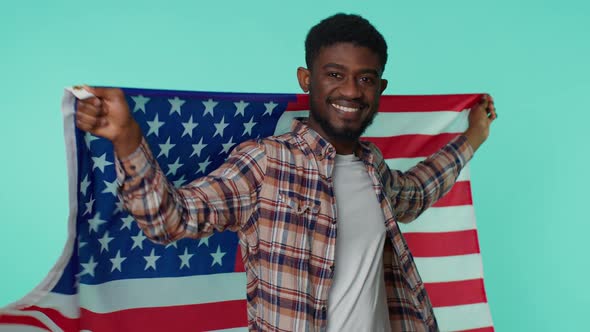 Man Waving Wrapping in American USA Flag Celebrating Human Rights Freedoms Independence Day