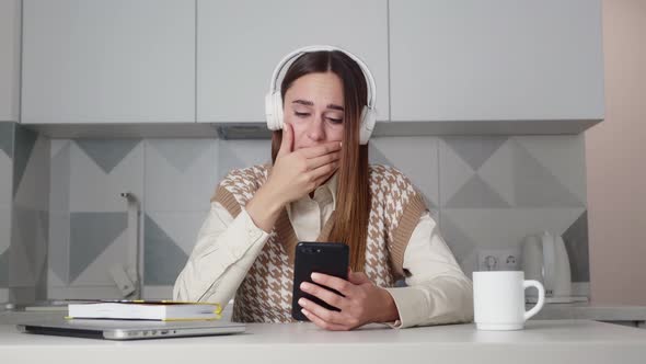 Woman Read Message on Smartphone Feels Upset By Bad News