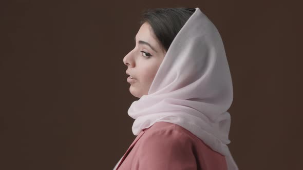 Portrait of Attractive Mixed-race Woman Wearing Headscarf