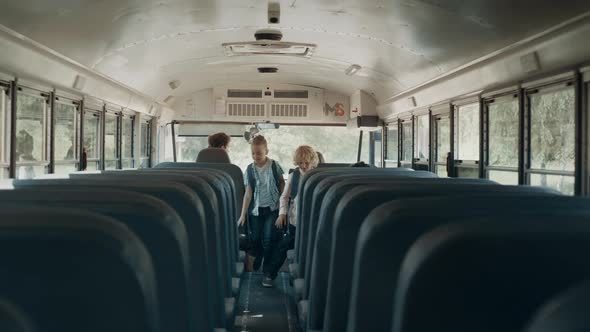 Multiethnic School Children Boarding on Schoolbus