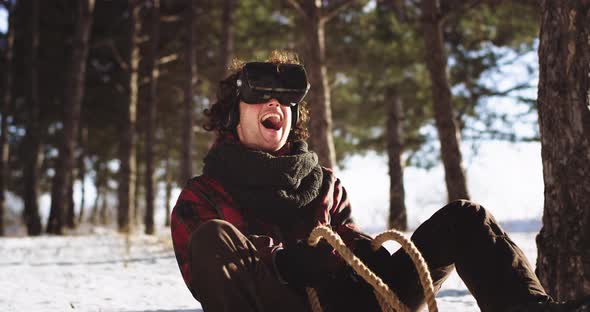 Guy Very Happy and Smiling Using a Virtual Reality