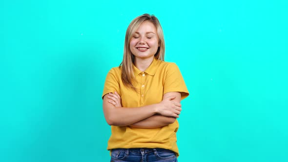 Happy Young Woman with Beautiful Smile Looks in the Room.